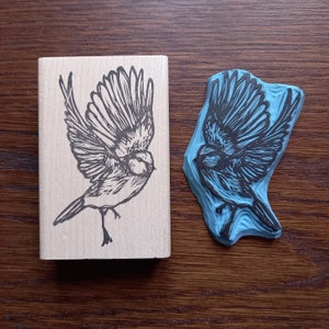 Rubber stamp flying bird