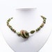 see more listings in the green gem necklace section
