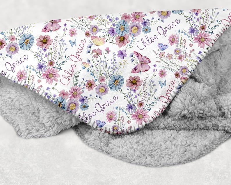 Custom Baby Blanket, Personalized Wildflower Baby Blanket, Wildflower Baby Girl Sherpa Blanket, Baby Girl Gift, Personalized Girl Name Blanket, Wildflower Nursery Crib Blanket, Soft Minky Blanket with Pink and Purple Wildflowers customized with name.