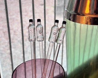 4 Cuatro agitadores vintage promocionales de Finlandia Vodka of Finland.