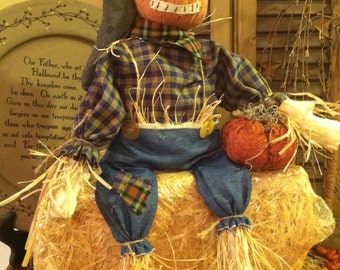 Primitive Country Scarecrow Pumpkin Doll with crow and holding pumpkin