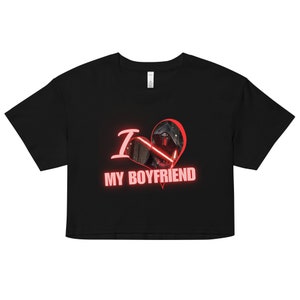 May include: Black cropped t-shirt with a red heart containing a character from Star Wars. The text "I  MY BOYFRIEND" is printed in red below the heart.