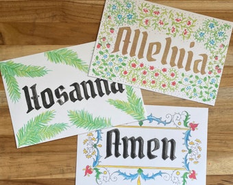 Könnte beinhalten: Drei handgemalte Karten mit Blumendesigns und den Worten "Hosanna", "Alleluja" und "Amen" in schwarzer Kalligraphie.