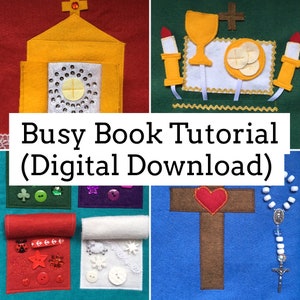 May include: A felt busy book with various pages featuring religious themes. The pages include a church, a chalice, a cross with a heart, and a rosary. The book is designed for children to learn about religion.