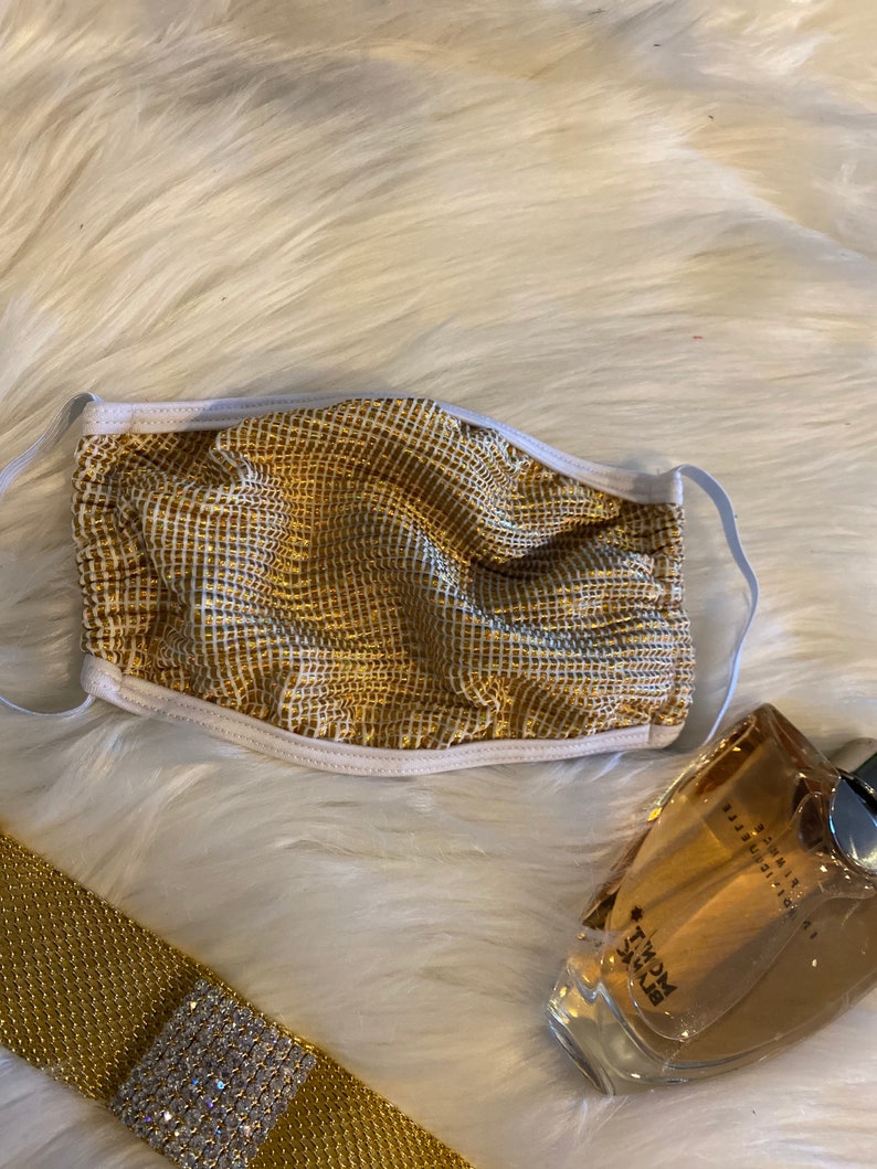 Textured gold sneeze guard