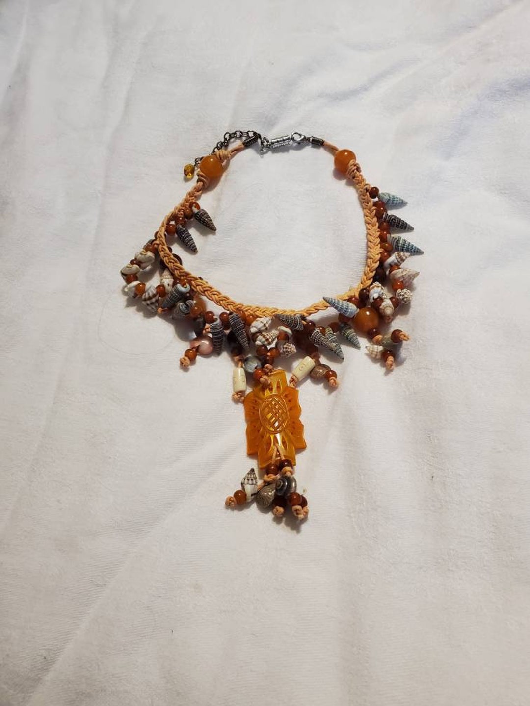 Aztec Shell Jewelry Whimsical, Orange Cord, Woven Shell Necklace With Aztec Sun Pendant ...