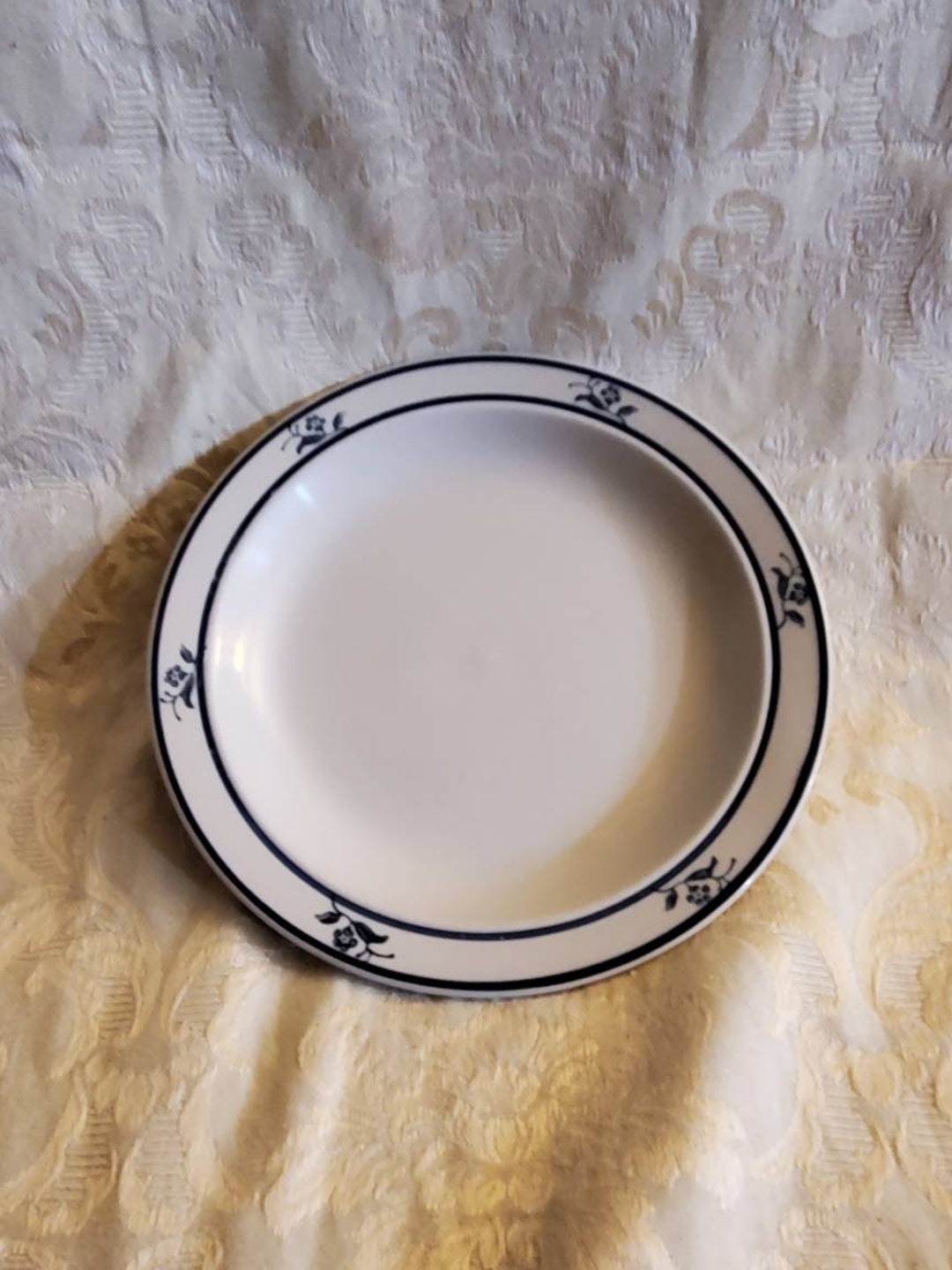 Brick Oven Stoneware, Scandia Blue, 7.75 Inch Salad Plate With Blue Flowers and Bands, off White