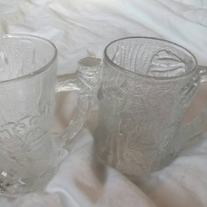 Conjunto de 2 canecas colecionáveis dos Flintstones do McDonalds de 1993, personagem de desenho animado Mammoth e Treemendous