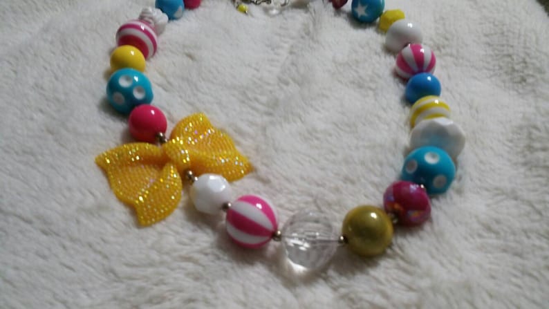 On Sale Bright Spring Colors with Yellow Glittery Bows Plastic Beaded 18 inch Necklace Circus Style Costume Jewelry Fashion Accessory