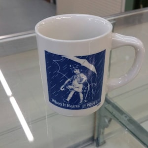 Morton Salt, &quot;When It Rains, IT POURS&quot;,1921 Log, Girl with Umbrella, Blue and White Mug or Coffee Cup, Hot Beverage Mug
