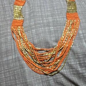 Bright Orange and Gold Toned Bead Multi Strand Expanding Bead Necklace Costume Jewelry 30 inch Fashion Accessory