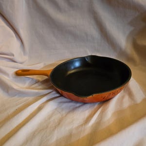 Used and Seasoned Spicy Vintage Le Creuset,  Made in France, Cast Iron Enamel Flame, 7.5 inch Short Handled Skillet Metal Handle