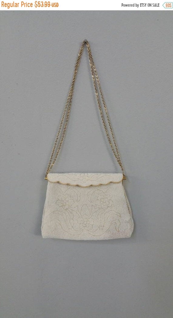 tiny white purse