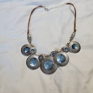 Vintage St. Thomas Jewelry, 20 inch Bib Necklace, Brown Cord with Silver Toned Bead,  Blue Center, Costume Jewelry, Fashion Accessory