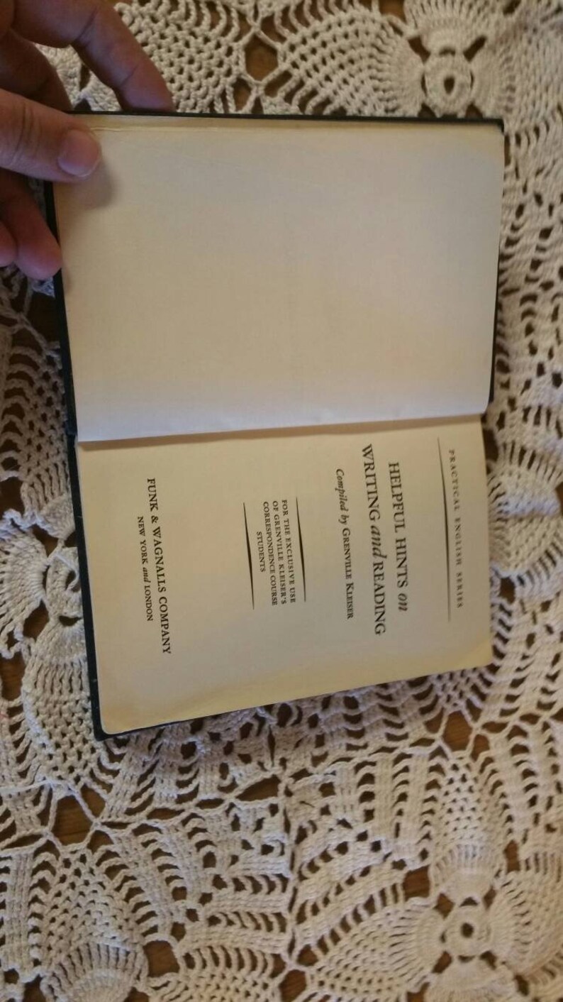 May include: A book titled "Helpful Hints on Writing and Reading" by Grenville Kleiser. The book is part of the Practical English Series and is published by Funk & Wagnalls Company in New York and London.