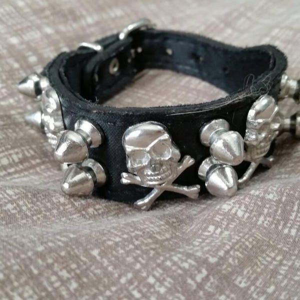 Rocker or Steampunk Style Skull and Cross Bones Silver Toned and Black Vinyl Bracelet Costume Jewelry Fashion Accessory