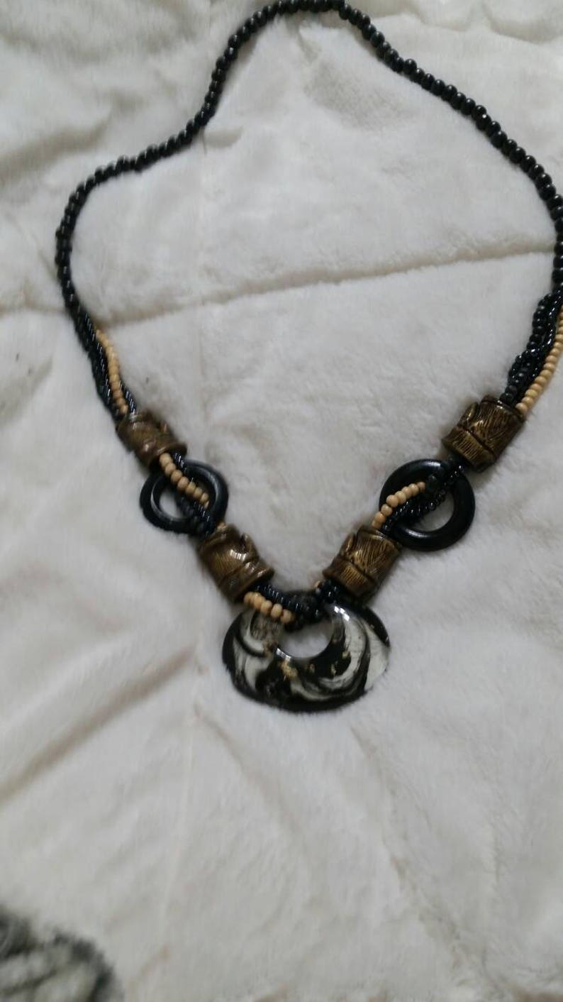On Sale Metal Free Boho Chic Black and Gold Toned Bead Single Strand Necklace with Oval Lucite Pendant 32 inch Necklace Costume Jewelry