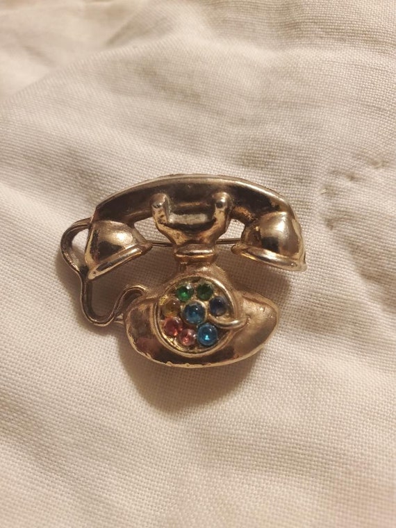 Bijoux vintage petite broche ronde avec strass et strass argentés