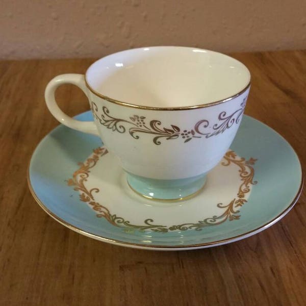 Homer Laughlin Lifetime China Company Tea Cup and Saucer Gold Crown Pattern White Plate with Robin Egg Blue