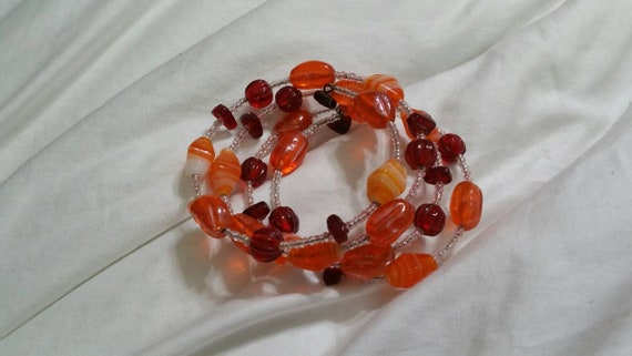 Orange and Red Plastic  Beaded Stretchable Memory… - image 2