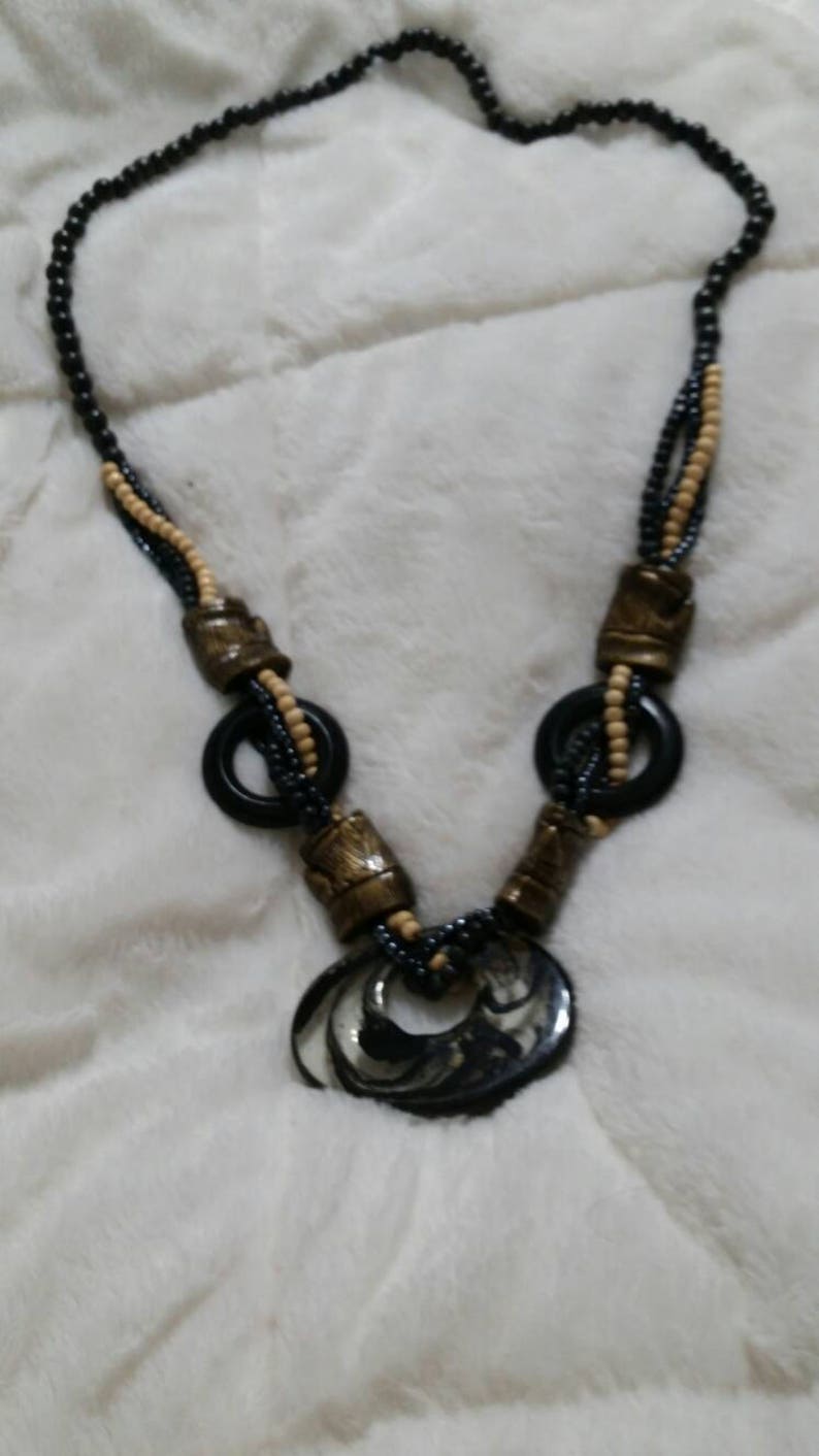On Sale Metal Free Boho Chic Black and Gold Toned Bead Single Strand Necklace with Oval Lucite Pendant 32 inch Necklace Costume Jewelry