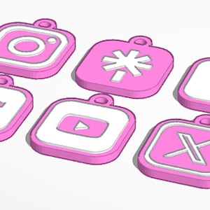 May include: Six pink and white social media logo charms, including Instagram, TikTok, Facebook, YouTube, and X. Each charm has a loop for attaching to a keychain or necklace.