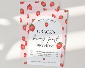 May include: A rectangular birthday invitation card featuring a light pink background with a repeating pattern of red strawberries. The center has a white arched frame with the text JOIN US FOR GRACE'S berry first BIRTHDAY, JAN 10 2025, THE PIERCE'S RESIDENCE, 111 BIRTHDAY AVE, MIAMI, FL 33333, AT 12 PM, RSVP TO STEPHANIE TO 305-555-1212.
