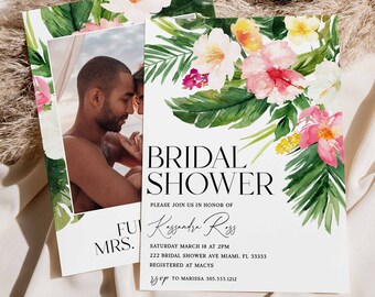 May include: Bridal shower invitations with a tropical floral design. The invitations feature watercolor illustrations of pink, white, and yellow flowers with green leaves. One invitation includes a photo of a couple. Text reads "Bridal Shower".