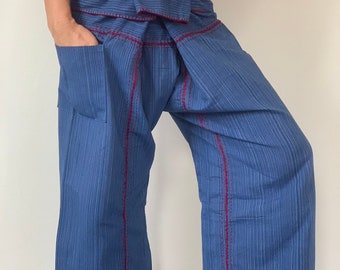 May include: Blue striped pants with red stitching. The pants have a wide leg and a tie at the waist.
