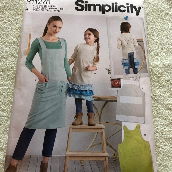 Uncut Factory Fold Sewing Pattern Simplicity R11278 Sizes Children's XS S M L And Adults' XS S M L And XL Adults And Children's Aprons 2021