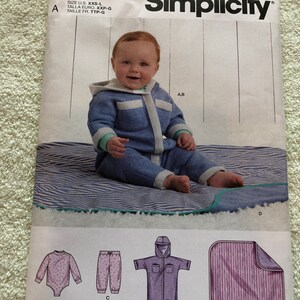 Uncut Factory Fold Sewing Pattern Simplicity R11268 Sizes XXS XS S M L Babies&#39; Bodysuit Jumpsuit Pant And Blanket Copyright 2021 Sold 19.95