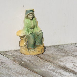 Ceramic Sitting Asian Lady