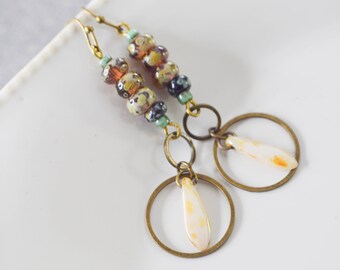 Long earrings circles light drops Czech glass, dangling earrings bronze