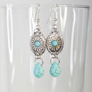 Dangling earrings with concho pattern charms and howlite turquoise drop, ethnic bohemian jewelry for women, ideal as a gift image 3