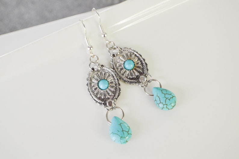 Dangling earrings with concho pattern charms and howlite turquoise drop, ethnic bohemian jewelry for women, ideal as a gift image 9