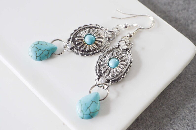 Dangling earrings with concho pattern charms and howlite turquoise drop, ethnic bohemian jewelry for women, ideal as a gift image 2