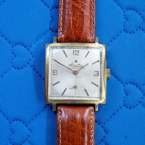 Vintage Aretta Swiss square men's watch  BELEIVE YOU CAN