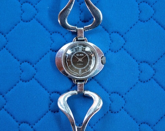 Slava Russian wind up, mechanical women's watch SILVER TULIP SOUND