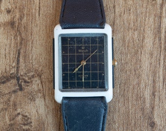 Mondaine Schweizer quadratische Uhr ELOQUENT SOUL MATRIX