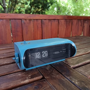 Radio alarm clock flip clock National Panasonic RC-1103B in baby blue