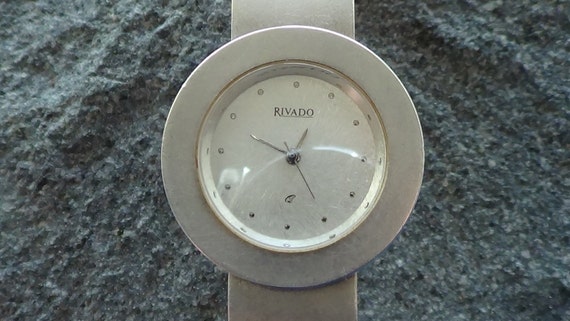 SEIKO - a stainless steel Perpetual Calendar quartz bracelet watch, ref.  8F32-970J, silvered dial wi