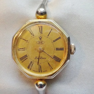 De Luxe vintage Swiss mechanical women&#39;s watch MULTIANGLED WARMTH WISH