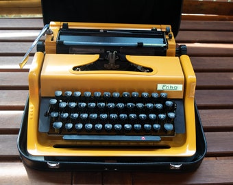 Erika Daro German GDR typewriter HOLLOW YELLOW MELLOw