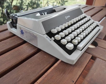 Vintage Royal Litton Japanese Typewriter with Case