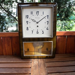 Jantar vintage Russian art deco mechanical wind up pendulum wall clock