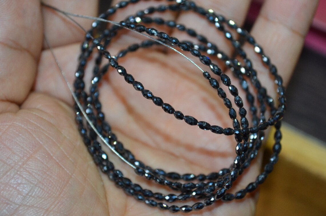 Fab Fab Ebony Shell 14x9mm Diamond Bead Strand 108257 main image 1