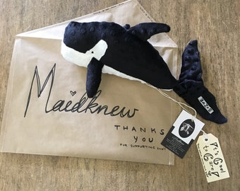 proceeds to kind causes Outrageous Orca plush rattle