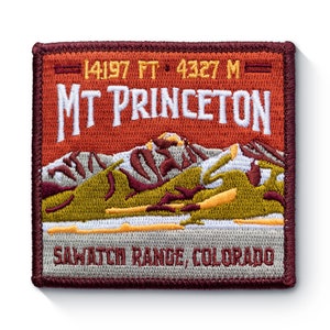 May include: A maroon embroidered patch with a white outline. The patch features a mountain range with snow-capped peaks and the text "MT PRINCETON" in white. The text "14197 FT. 4327 M" is above the mountain range and the text "SAWATCH RANGE, COLORADO" is below the mountain range.