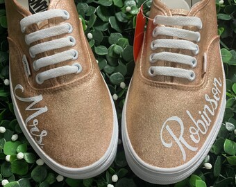 rose gold and black vans
