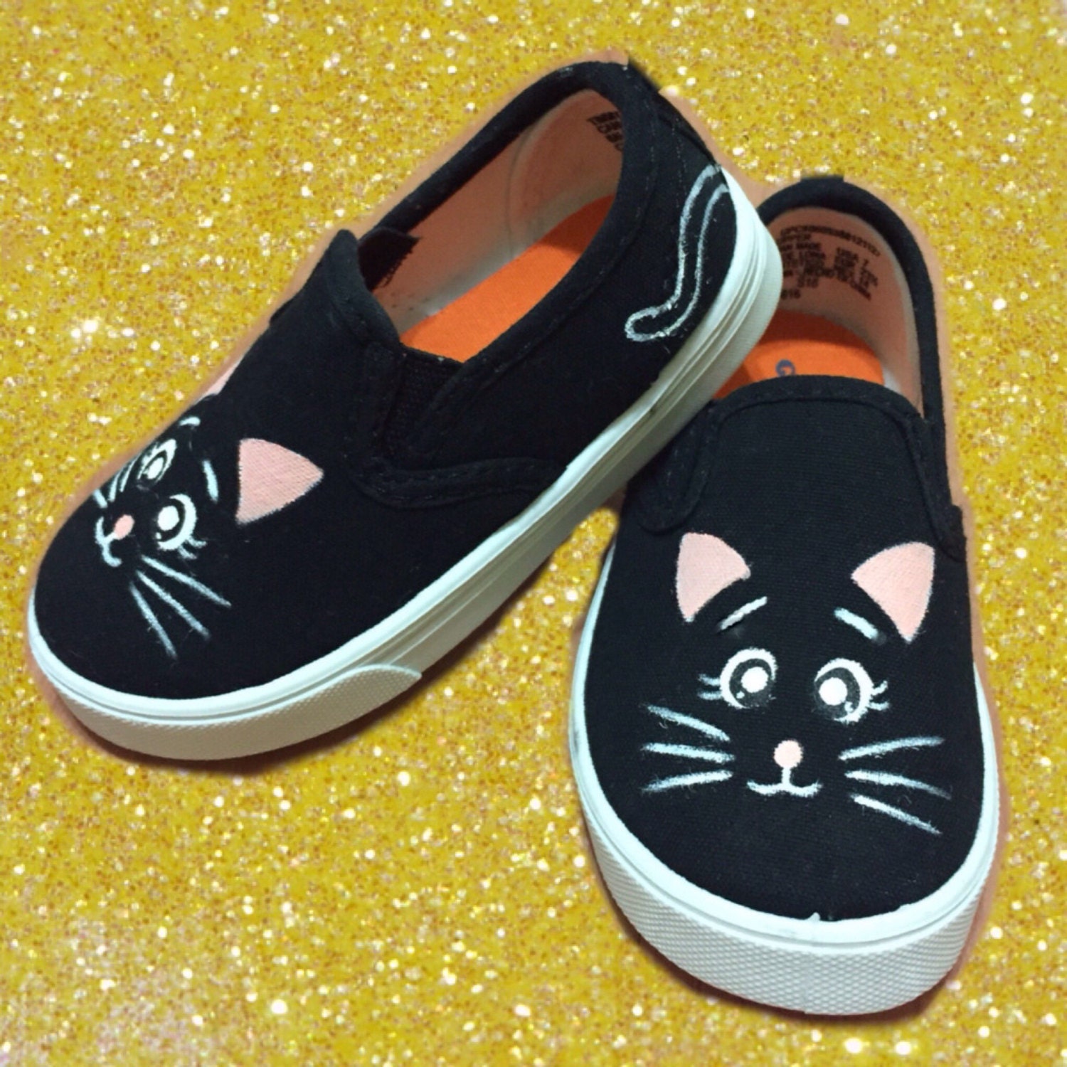 shoes with cat faces on them